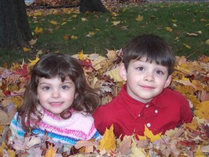 Kids in leaves